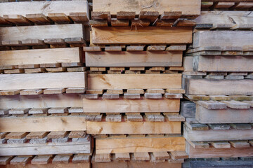 Background and Stack of Timbers or wooden palettes.  