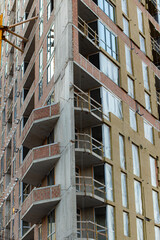 vertical picture of unfinished building construction concept exterior facade architecture background