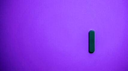 letter of the anguilla alphabet on a pink background