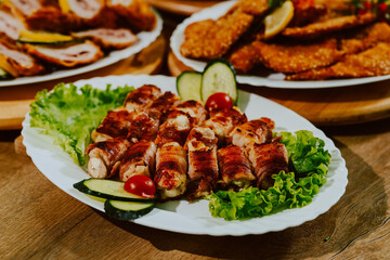 Served meat on the table for guests at the party. Delicious food for a special event
