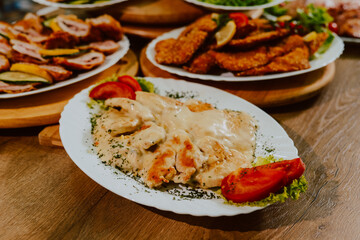 Served meat on the table for guests at the party. Delicious food for a special event
