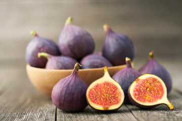 fresh figs on a wooden table , close-up.