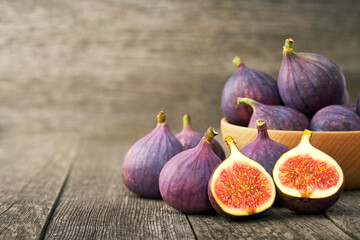 fresh figs on a wooden table , with copy space.