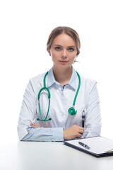 Fototapeta premium Portraif of Professional Female Caucasian Otolaryngologist Posing Against White Background.