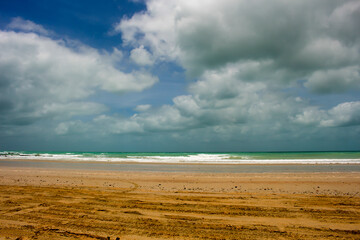 Waves rolling in as the tide ebbs out on a late morning in the Indian Ocean at Cable Beach, Broome...