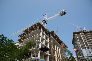 Cranes over the condominium construction site, Toronto, Ontario, Canada.