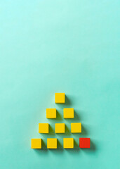 Business material, pyramid-shaped block. Society, organization, strategy, top-down, basics, etc....