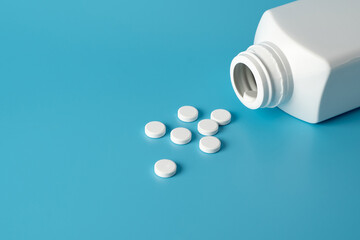 medicine pills on blue background Copy space for text Assorted pharmaceutical Healthy Eating, Lifestyle.