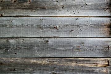 Texture of old wooden boards with rusty nails.