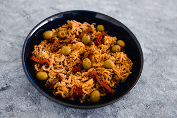 plant-based food, vegan breadcrumbed ginger noodles with sundried tomatoes and olives