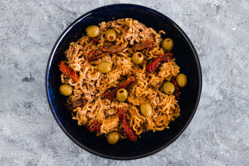 plant-based food, vegan breadcrumbed ginger noodles with sundried tomatoes and olives