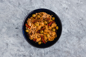 plant-based food, vegan breadcrumbed ginger noodles with sundried tomatoes and olives