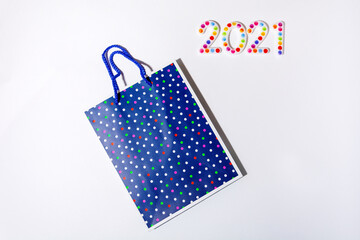 Happy New Year 2021. Symbol from number 2020 on white background and gift package