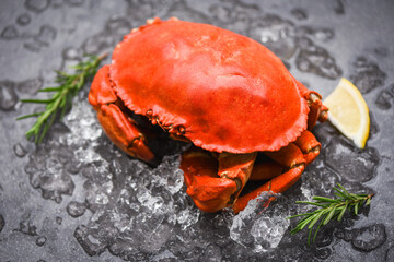 Seafood shellfish Steamed red crab or Boiled stone crab - Fresh crab with ingredients lemon...