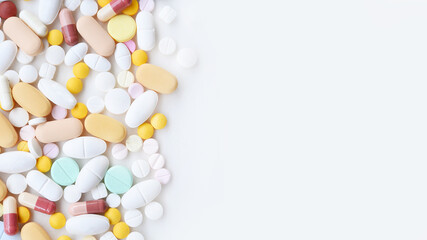 a lot of pills medicine isolated on white background