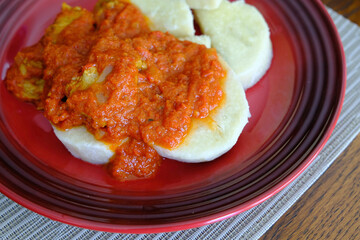 Nigerian Boiled yam served with Spicy Tomato Pepper Stew
