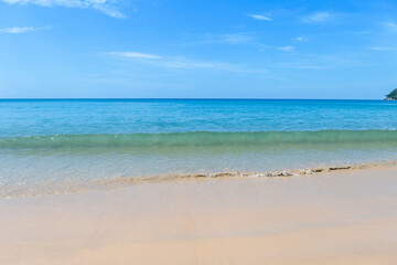 Clear sea water wave on clean sand beach on Phuket island in South of Thailand, summer outdoor day light, clean environmental concept, nature background