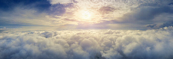Panorama of Flying over the clouds.