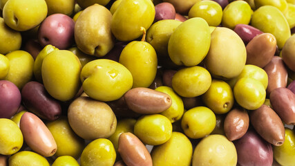 Tasty mix olives background.