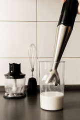 Immersion blender (hand blender) with whisker and chopper (food processor) black and silver in the...