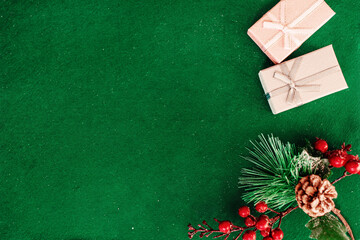 Christmas composition frame for text. Flat lay, top view - greeting card template christmas and New Year. Christmas decorations on a green background