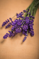 Fresh flowers of lavender bouquet on rustic wooden background