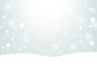  雪の結晶とふわふわの雪が降る雪原の風景　背景素材（銀色）