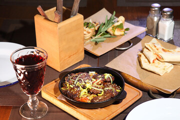 Fried beef liver with onions. Beer pub. Sports bar.