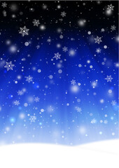 光芒と雪の結晶とふわふわの雪が降る雪原の風景　背景素材（青）縦