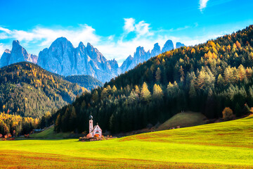 Fototapeta na wymiar Majestic scenery in Dolomites with the St. John's in Ranui Chapel.