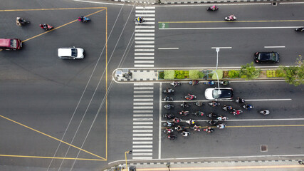 top view of the vehicle that stopped before the zebra cross