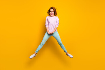Fototapeta na wymiar Full body photo of excited enthusiastic woman jump enjoy autumn fall free time holiday wear modern clothes white gumshoes isolated over yellow color background