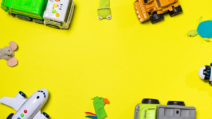 Obraz premium Toys on a yellow background with space for text banner. Copyspace. For the toy and children's goods store
