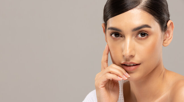 Beauty asian women  touching soft chinskin close up face beauty .