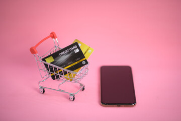 shopping cart with credit card ,smartphone ,shopping online concept