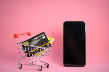 shopping cart with credit card ,smartphone ,shopping online concept