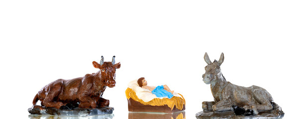 The Baby Jesus in the manger with the ox and the mule