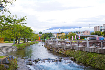 Fototapeta na wymiar View of mt. Fuji and Kanda River from Fujisan Hongu Sengen Taisha shrine in Fujinomiya town, Shizuoka, Japan.