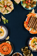 Assorted Middle Eastern foods with empty space for text