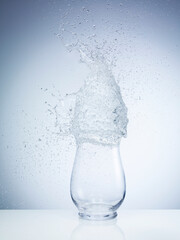 Exploding water balloon on the vase