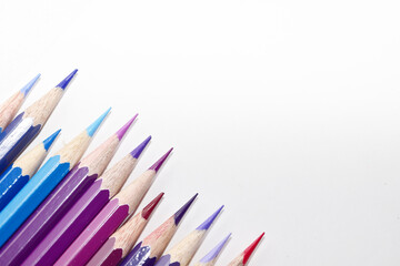 Fototapeta premium Many Color pencils isolated on white background close up. Color pencils for drawing as a background