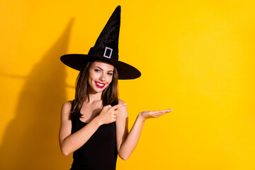 Portrait of her she nice-looking attractive pretty cute content cheerful lady wizard holding on...