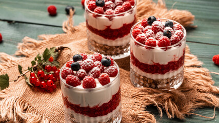 Parfait with granola, berries and whipped cream. fresh raspberry dessert, catering, banner menu recipe place for text