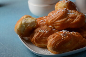 Traditional french dessert eclair with custard 