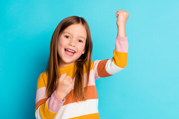 Close-up portrait of her she nice attractive pretty lovely cute lucky cheerful cheery girl rejoicing celebrating incredible news isolated over bright vivid shine vibrant blue color background