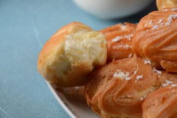 Traditional french dessert eclair with custard 