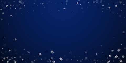 Sparse snowfall Christmas background. Subtle flyin