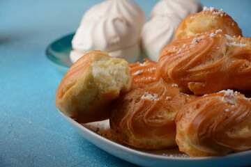 Traditional french dessert eclair with custard 
