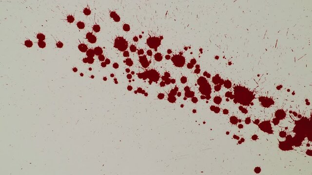 Red blood drips on the white paper