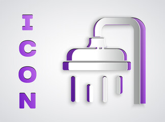 Paper cut Shower head with water drops flowing icon isolated on grey background. Paper art style. Vector Illustration.